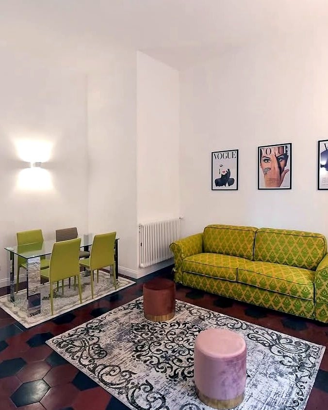 Vatican Apartment — living room and dining area
