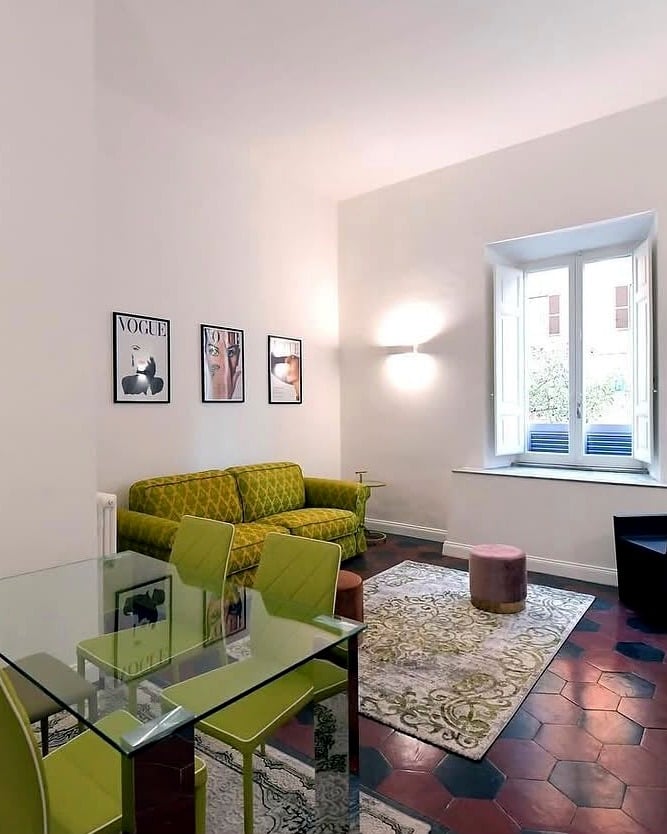 Vatican Apartment — living room by the window